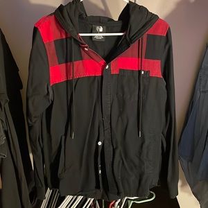 Buffalo plaid/ black flannel with hood and pockets. Size small.